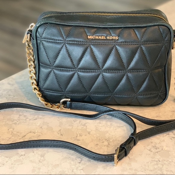 Michael Kors black small purse with gold link strap. Used. - Picture 2 of 7